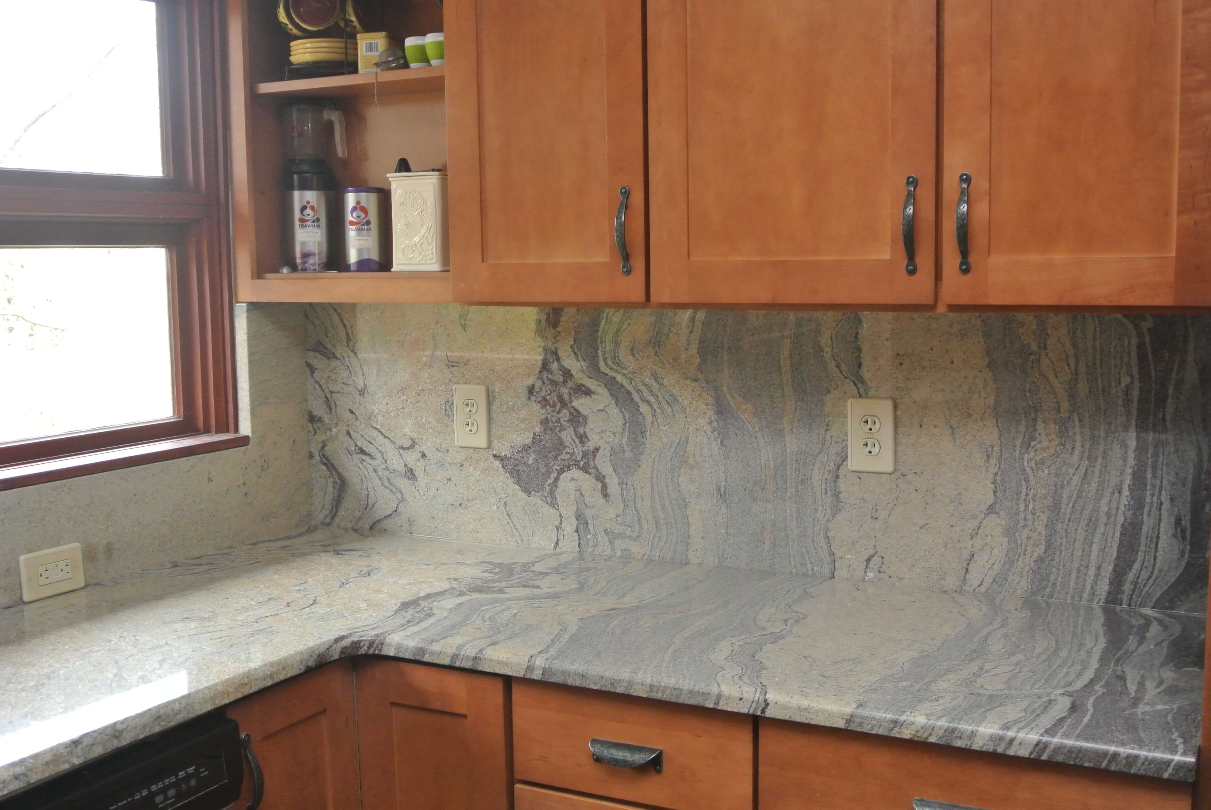 Granite countertops are a centerpiece in this kitchen.