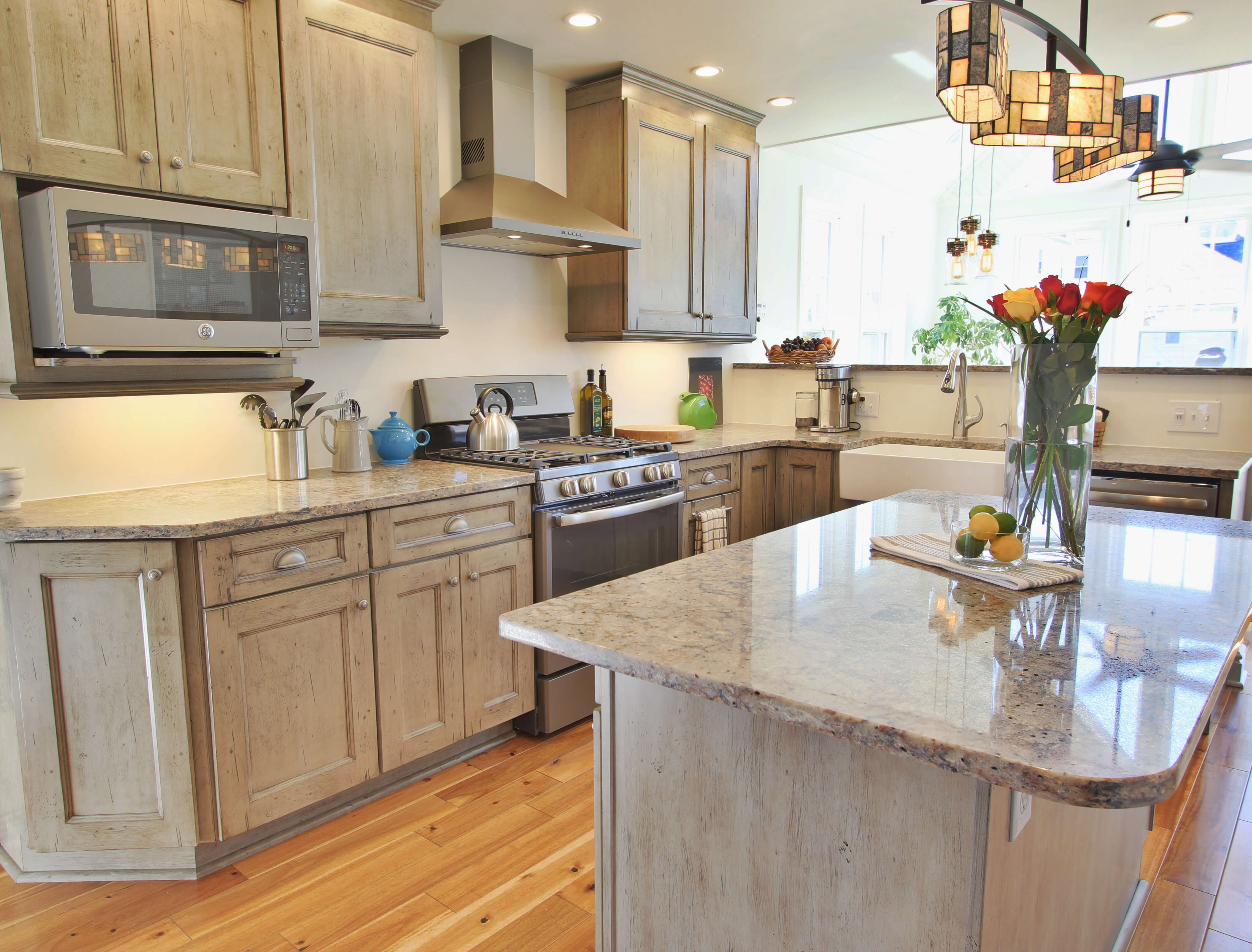 Quartz counters brigten up this kitchen.