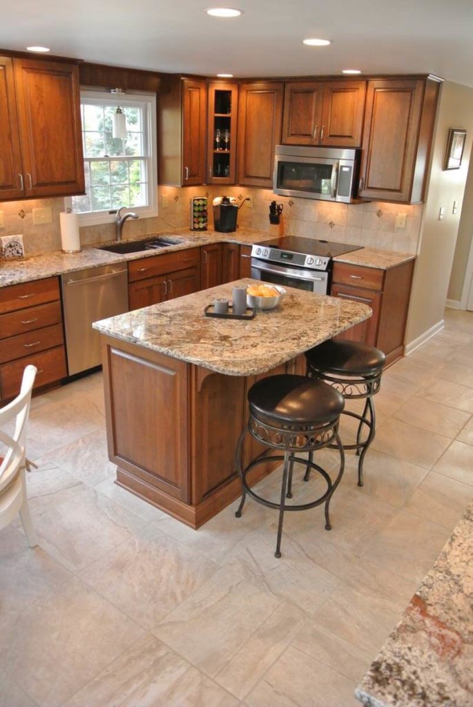 Work with a kitchen designer to decide whether the work triangle or work zones are best for your kitchen.